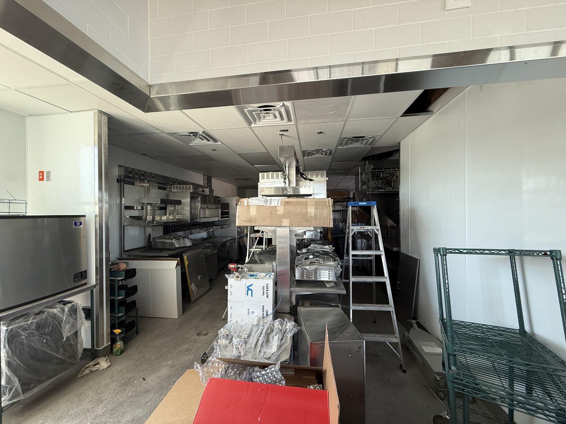 Commercial kitchen electrical installation in progress — Taco Bell Benson